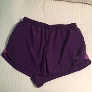 Purple Nike shorts